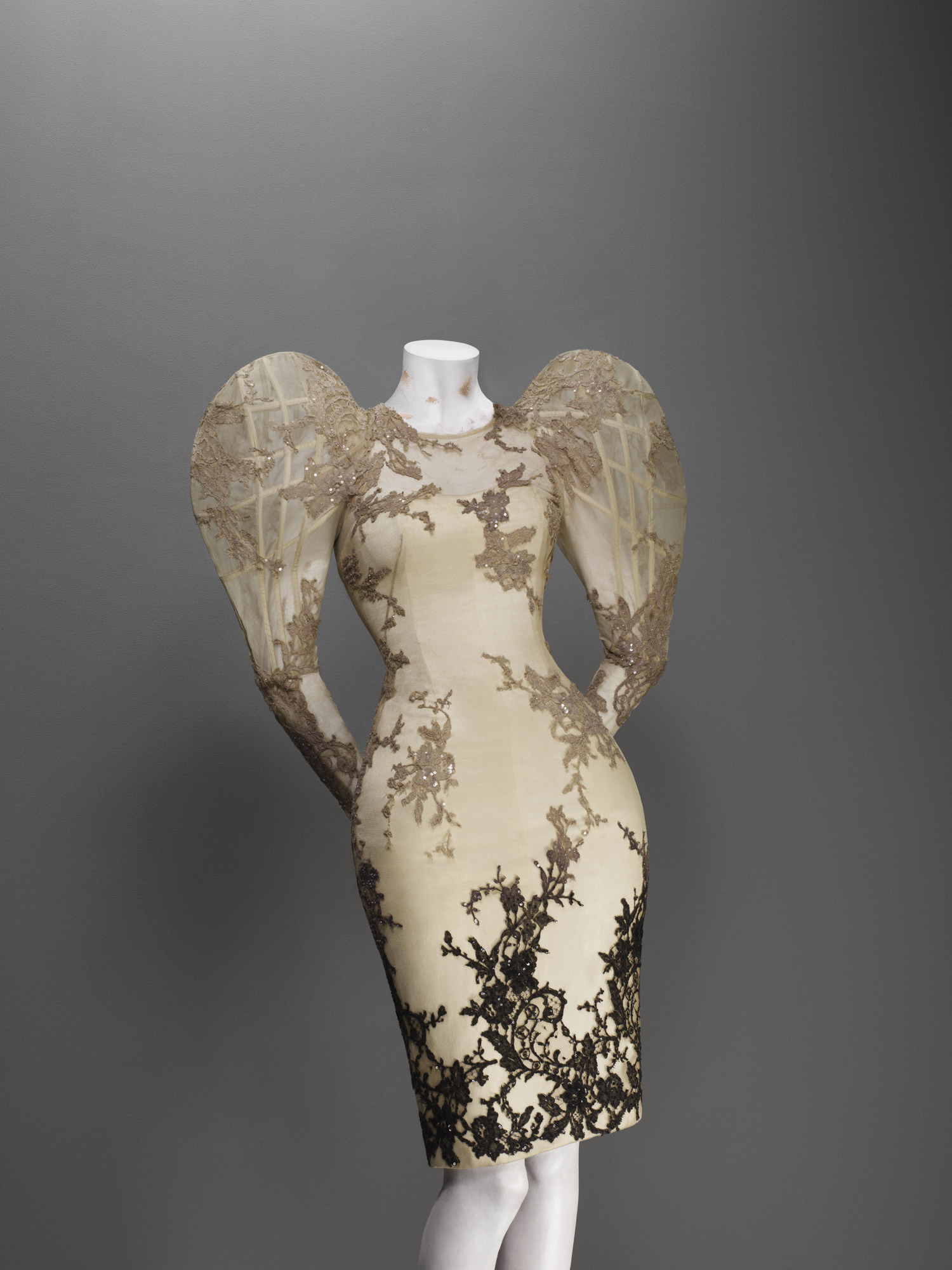 Alexander McQueen - A Sarabande lace dress worn with a black