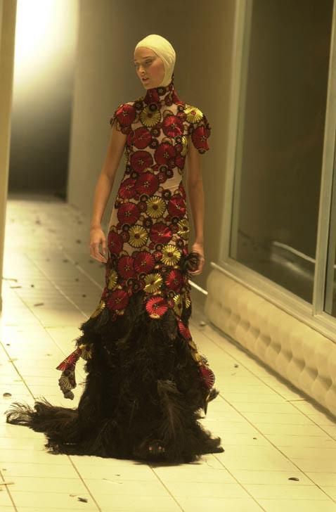 Erin at Alexander McQueen (British, 1969–2010) Dress - VOSS, spring/summer  2001. Red and black ostrich …